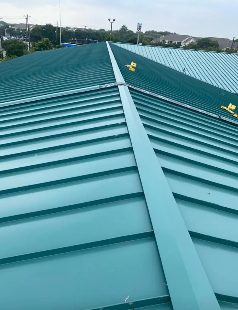 Green commercial metal roof ridge and valley for Metal Roof Repair in McLean